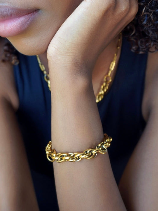 A Weathered Penny Knot Bracelet in Gold